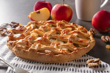Tasty homemade apple pie on table