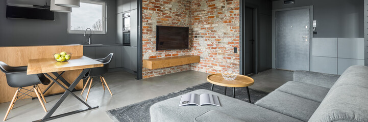 Home interior with brick wall