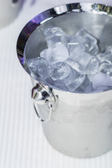 Silver bucket with ice