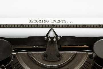 Text Upcoming Events written in vintage type writer from 1920s