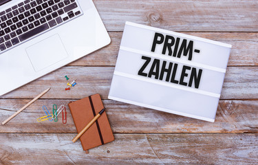 German Primzahlen (prime numbers), office desk flat lay