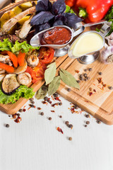 Big set of different sauces, spices and food ingredients flatlay. Top view. copy space