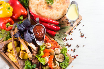 Big set of different sauces, spices and food ingredients flatlay. Top view. copy space