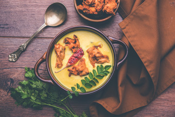 Punjabi Kadhi Pakoda or curry Pakora, Indian cuisine served in a bowl or karahi, selective focus