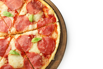 Wooden board with tasty pepperoni pizza on white background