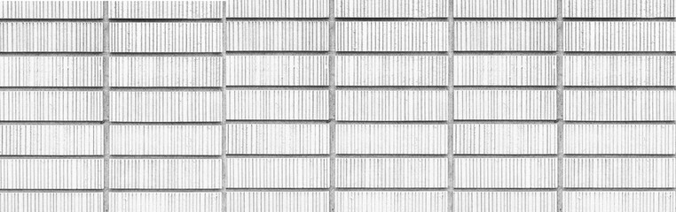 Panorama of White stone brick wall pattern and seamless background
