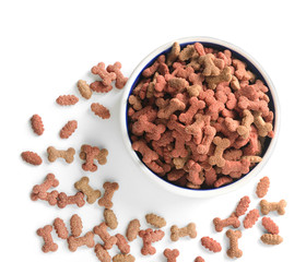 Pet food in bowl on white background