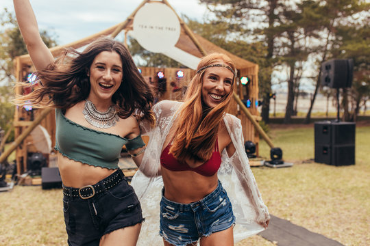 Two cool girls at music festival