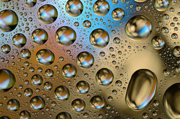Colored Water Drops on a smooth glass surface