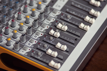 Audio studio sound mixer equalizer board sliders, faders and knobs