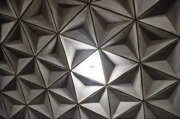 Fototapeta premium decorative figured interior from triangles: walls, ceilings, floor