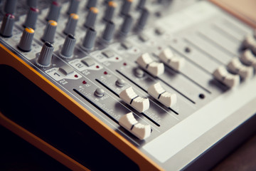 Audio studio sound mixer equalizer board sliders, faders and knobs
