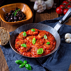 Rustic mini meatballs Baked in tomato sauce with basil