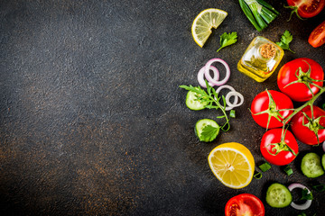 Cooking background, fresh salad ingredients, italian cuisine - tomatoes, olive oil, lemon, cucumbers, arugula, parsley, onions, Dark rusty background copy space top view