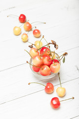 Naklejka na ściany i meble Ripe rainier cherry, yellow agricultural berry.