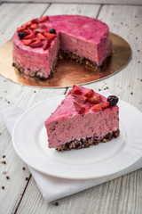 Strawberry Cake dessert with vanilla cream on wooden background