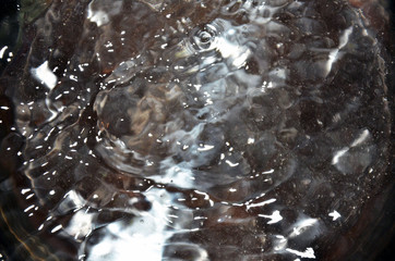 the texture of the water. bubbles. sea. blue water. river. unusual abstraction. texture white...