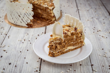 White Chocolate vegane cake with nuts and cream. Birthday concept