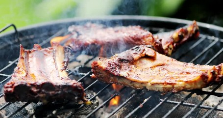 american bbq ribs cooking on grill