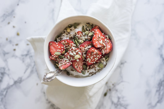 Healthy Breakfast Bowl with Strawberries & Seeds