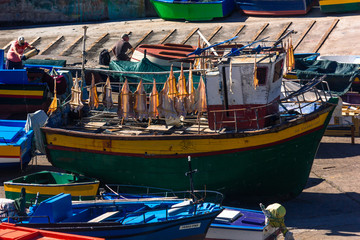 Fish drying in the sun in the harbour of Camara de Lobos on Madeira, Portugal