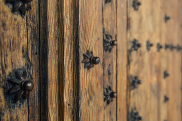 Antique wooden church door or gate detail background