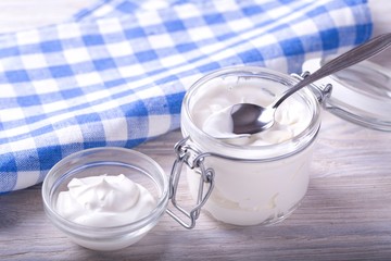 Bowl of cream. Tasty sour cream