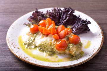 Chicken fillet and cherry tomatoes with sauce