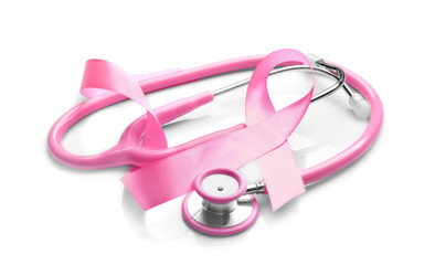 Pink ribbon and stethoscope on white background. Breast cancer awareness concept