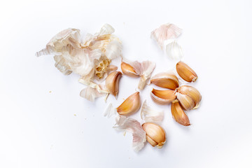 Garlic cloves with bumpy ( Allium sativum ) peeled  isolated on white background, Pattern concept