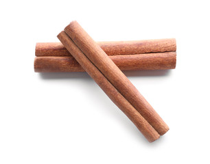 Aromatic cinnamon sticks on white background