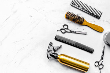 hairdresser working desk with tools on white background top view