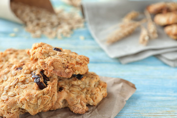 Delicious oatmeal cookies on wooden background, closeup