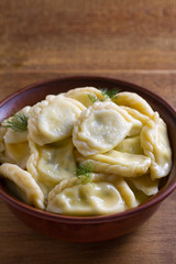 Dumplings, filled with cottage cheese (farmer cheese). Varenyky, vareniki, pierogi, pyrohy