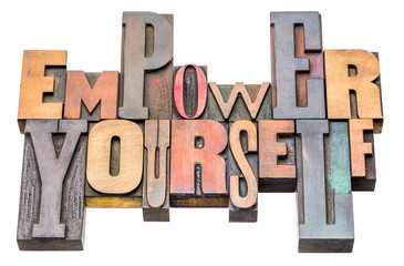 empower yourself word abstract in wood type
