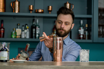 bartender prepares a great cocktail