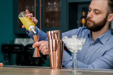 bartender prepares a great cocktail