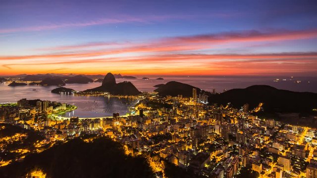 Sunrise over Pao Acucar or Sugar loaf mountain and the bay of Botafogo, Rio de Janeiro, Brazil, South America 