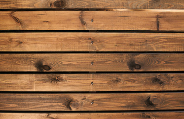 Table top as a background of wooden boards texture with carnations.