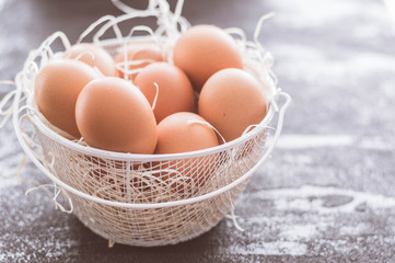 Eggs in a white basket