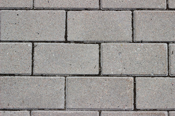 Concrete grey paving stones background 