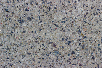 gray concrete with stones texture