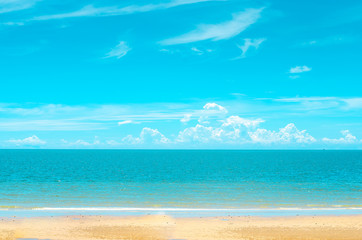 Fototapeta na wymiar Tropical beach in morning with blue sky and cloud at Huahin, Thailand, Wat Khao Takiap