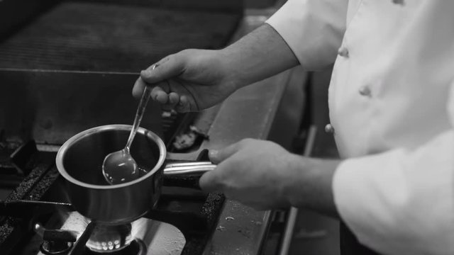 Chef Tossing Wok Of Sliced Peppers. 