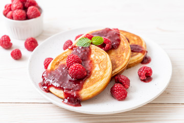 pancake with fresh raspberries and raspberry sauce