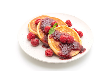 pancake with fresh raspberries and raspberry sauce
