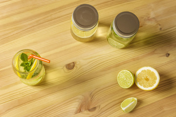homemade lime and lemon sodas in glass jars