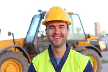 Joyful handsome worker at work