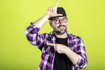 Person making loser sign