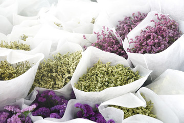 Little flowers in the white bouquet